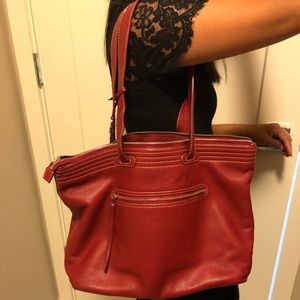 Red reversible leather tote bag